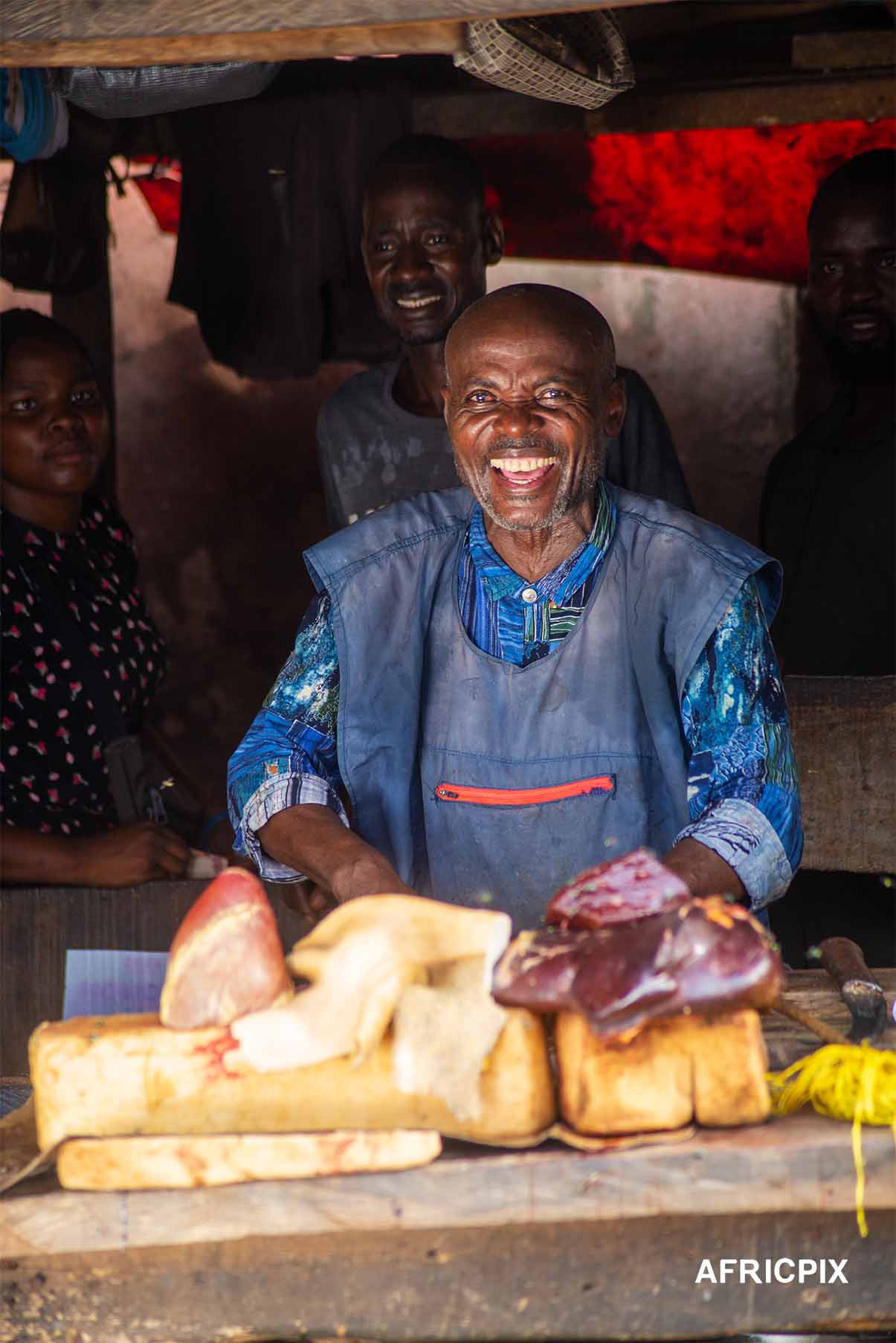 Nigeria Market Man Butcher In Front of Shop