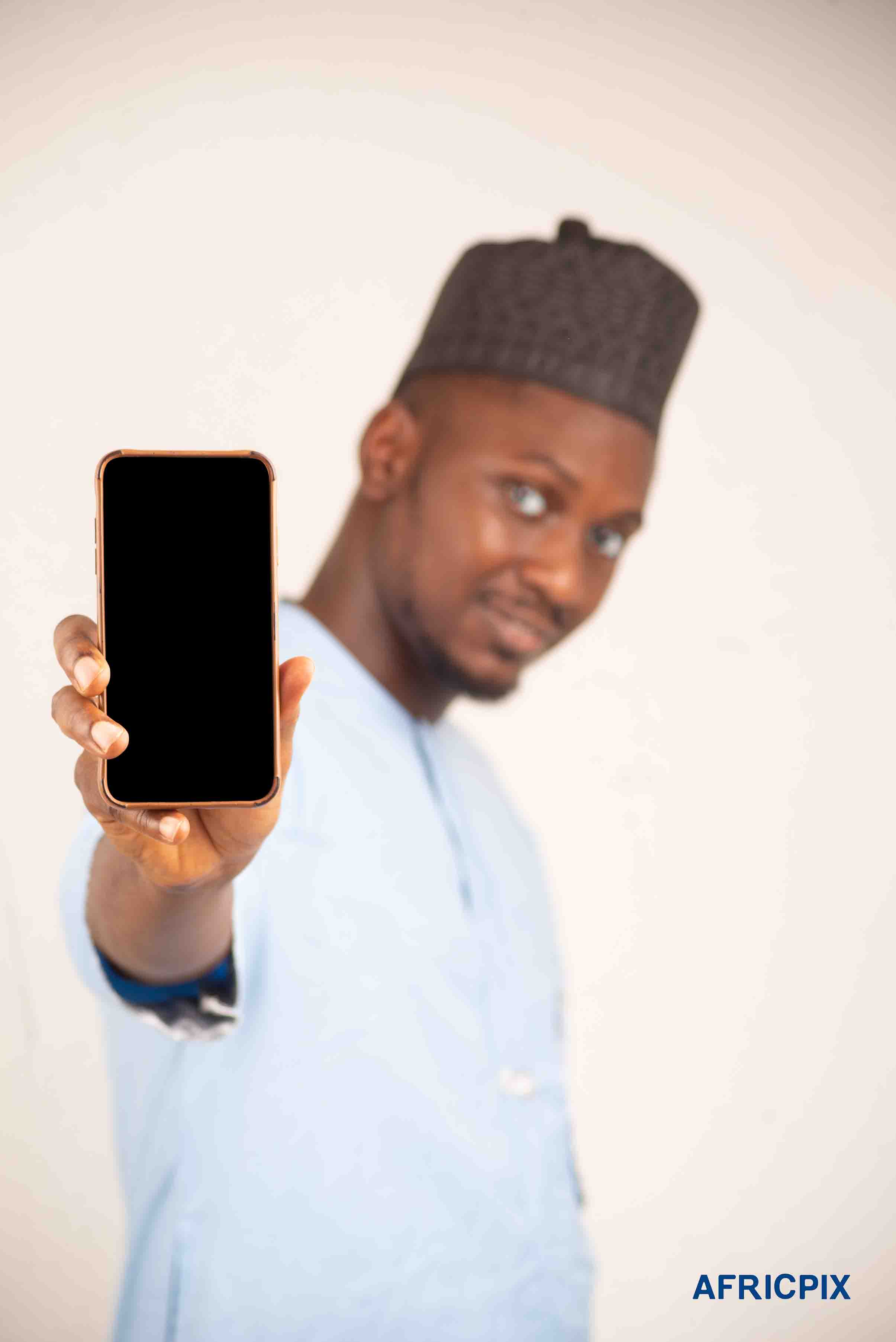 Nigeria Hausa Man Holding Phone