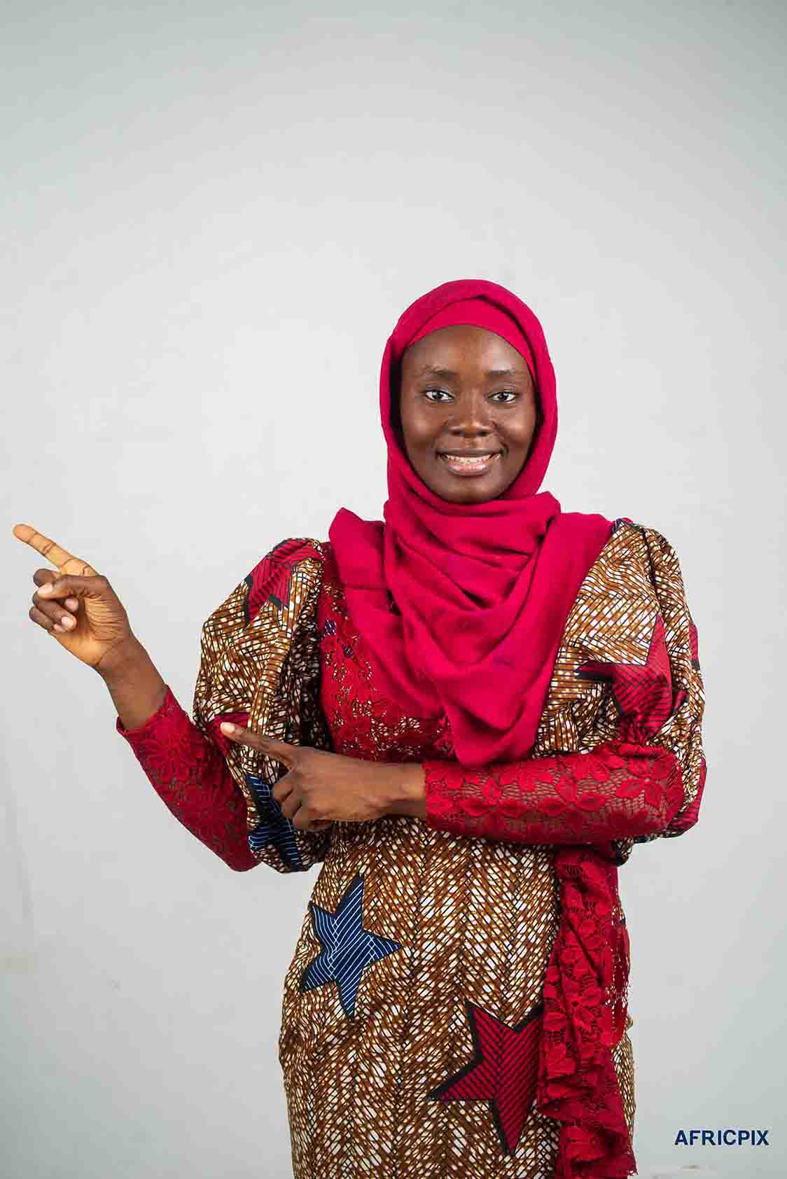 Nigeria Hausa Woman Pointing up Side Two