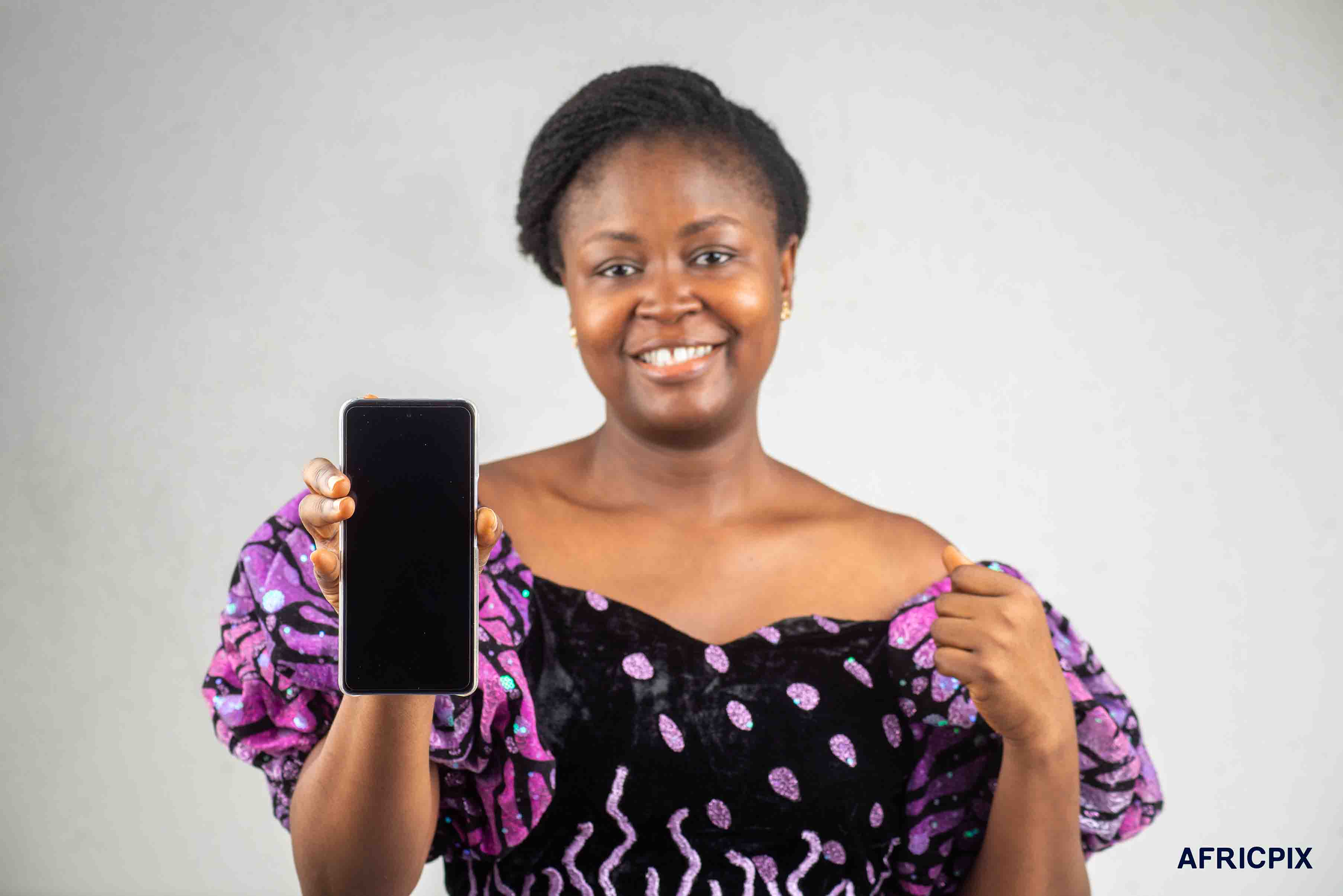 Nigeria Woman Pointing Phone At Camera