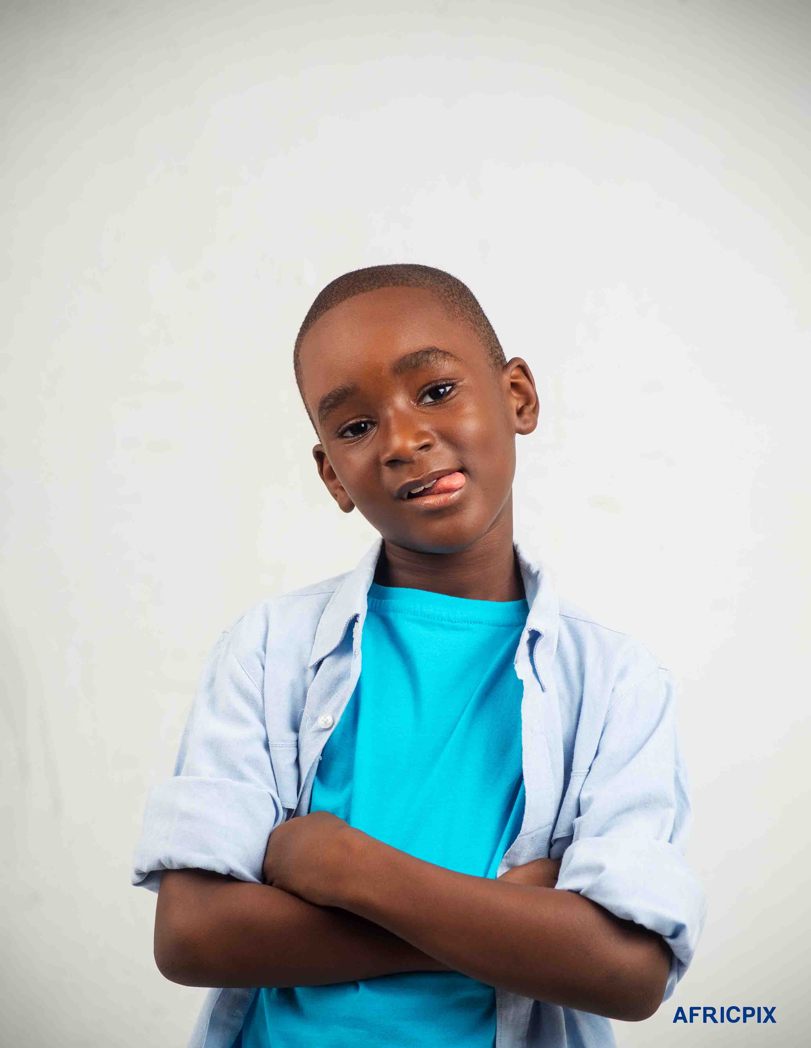 Nigeria Child Boy Stand Fold Arm With Tongue