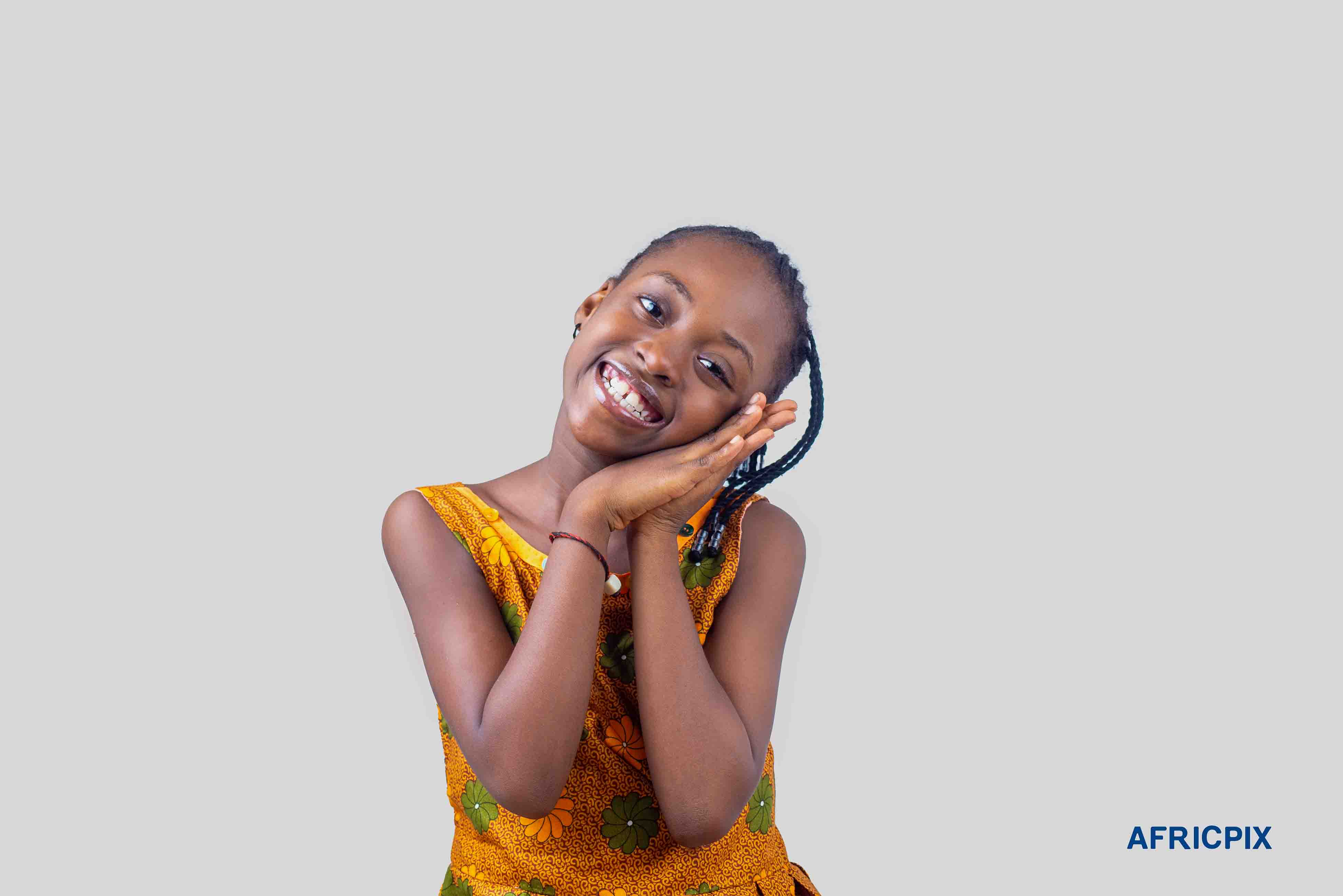 Nigeria Child Boy Wearing Native Attire Smiling Hands on face